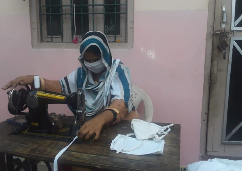 Women Community Leaders Make Masks to Alleviate Shortage